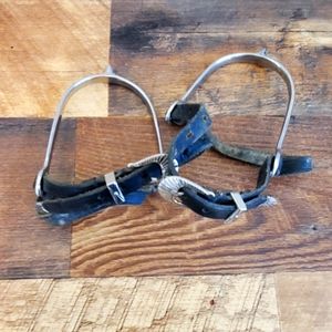 English spurs with black leather straps